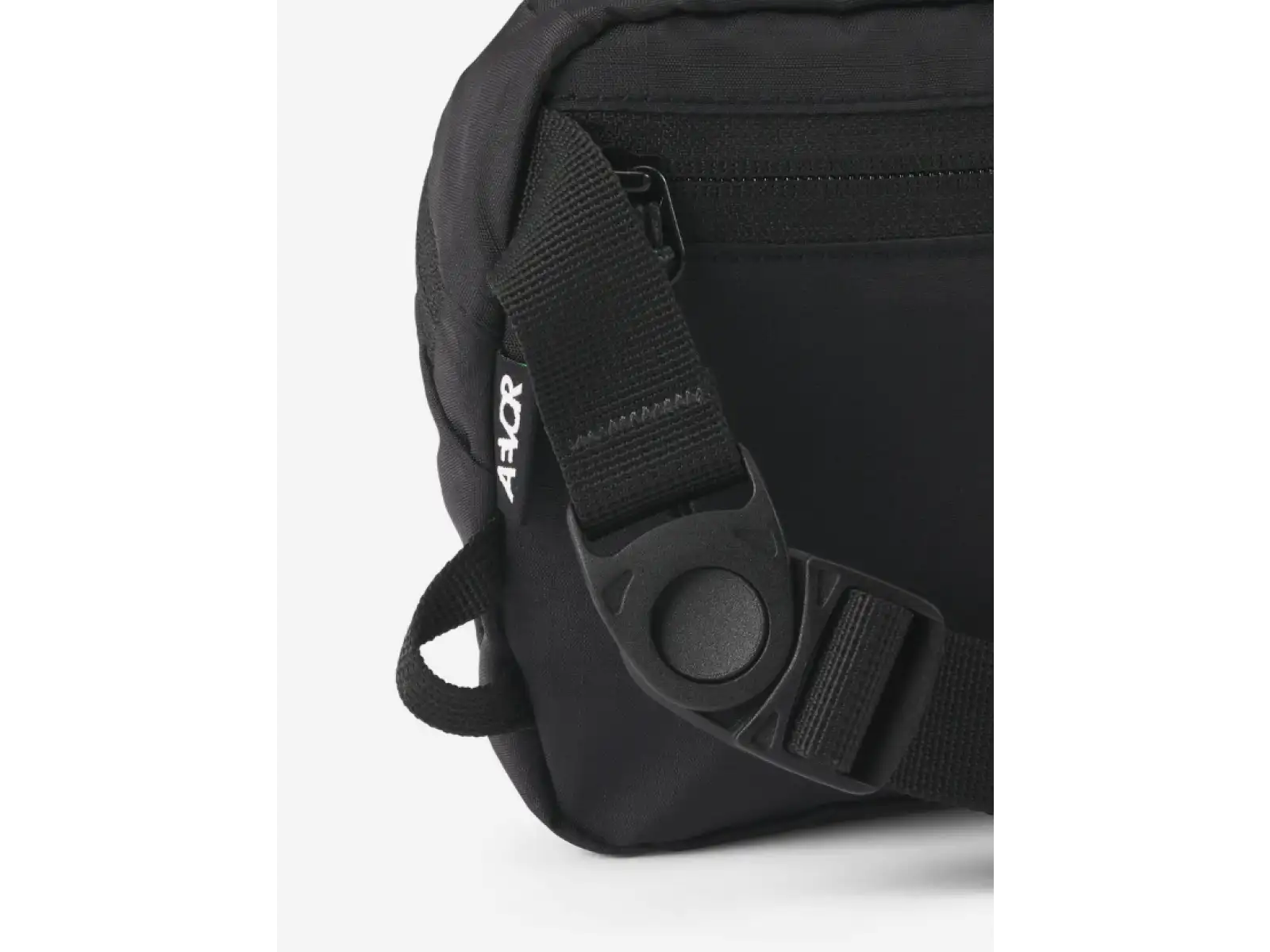Aevor Hip Bag Move 1,5L taštička přes rameno/ledvinka Black