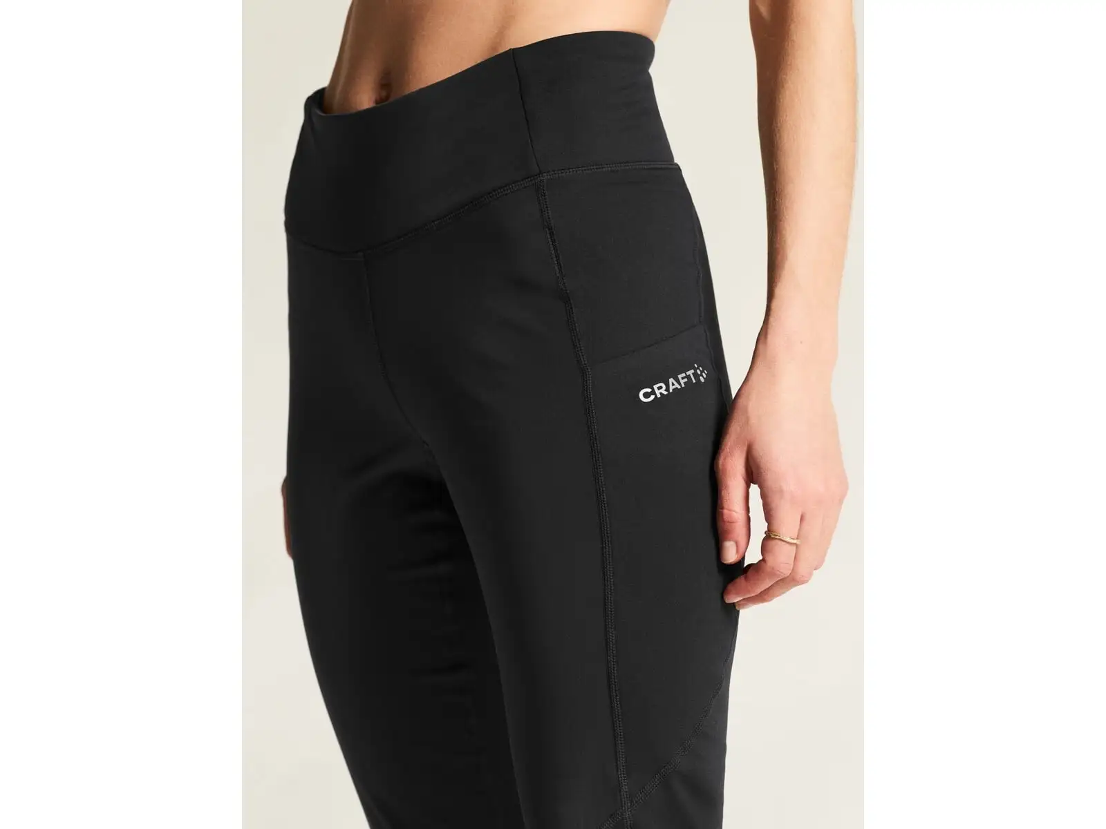 CRAFT ADV Essence Warm Wind Tights 2 dámské běžecké legíny černá