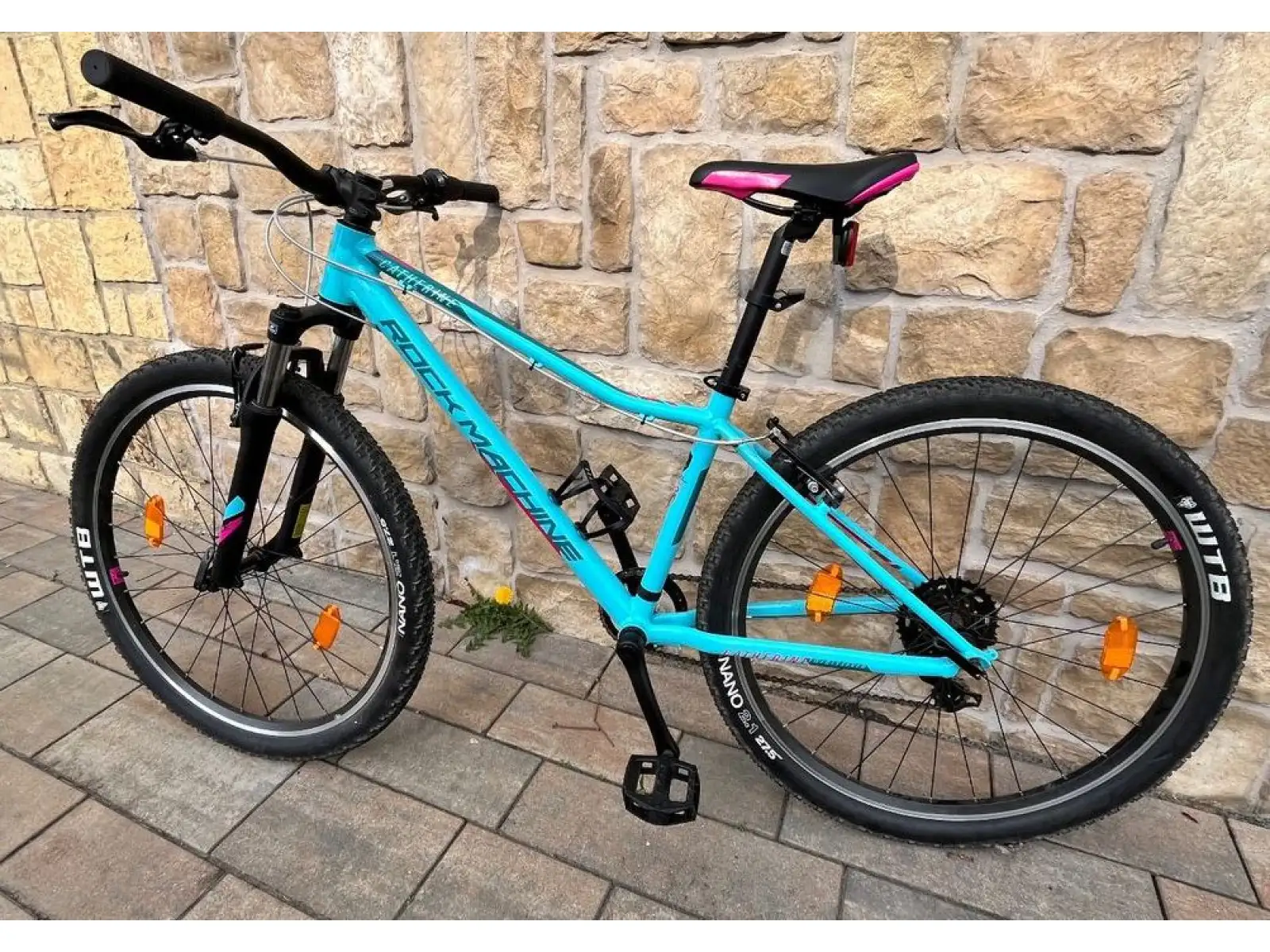 Rock Machine Catherine 27 dětské kolo Gloss Neon Blue/Petrol/Pink
