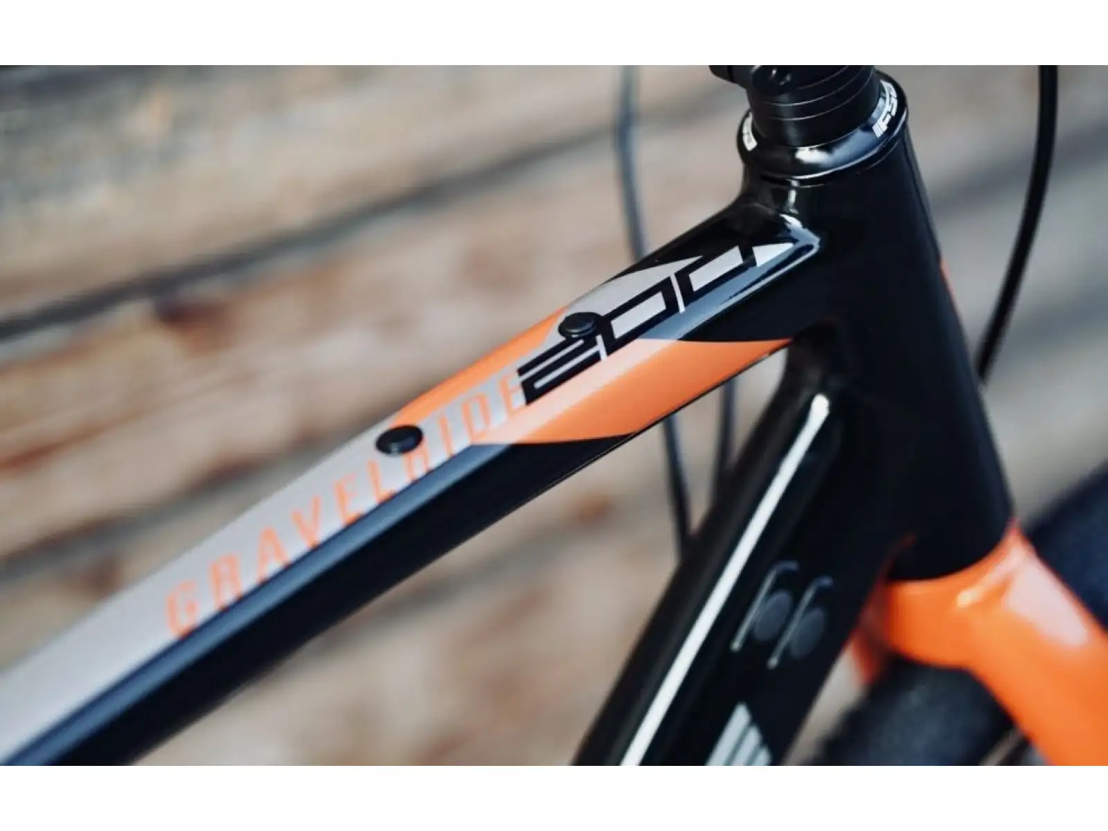 Rock Machine Gravelride 200 gravel kolo Gloss Black/Brick Orange/Silver